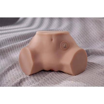 Fennie Shaking Masturbator 4 kg in realistic torso design for lifelike solo play, featuring soft TPR construction on fabric background.