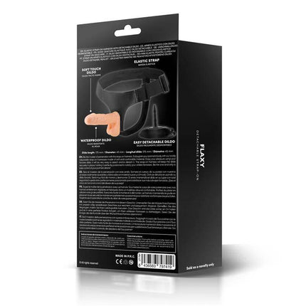 Packaging of Flaxy Strap-On Harness with Detachable and Flexible Dildo featuring product details and illustrations.