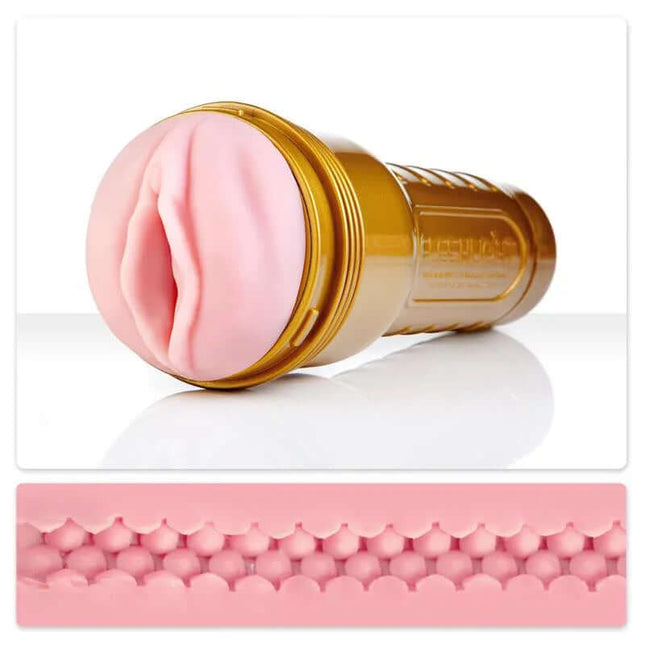 Fleshlight Stamina Training Unit Pink Lady with gold case and textured canal for enhanced control and sensation.