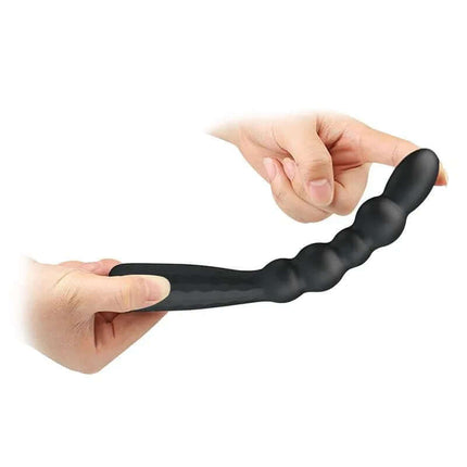 Flexible Anal Vibrator in hand showing flexibility and design for enhanced comfort and versatile play