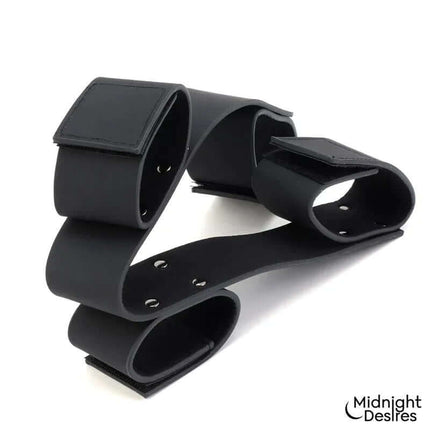 Flexible Bondage Bar by Midnight Desires made of vegan leather for secure and comfortable restraint.