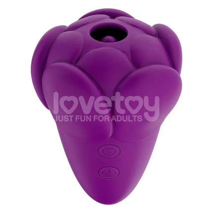 Flicker Stimulator flower-inspired vibrator in purple with silicone exterior and USB rechargeable design.