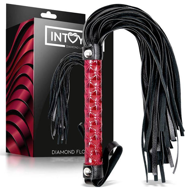 Flogger Diamond Vegan Leather featuring a textured red handle and black vegan leather straps, designed for luxurious comfort and style.