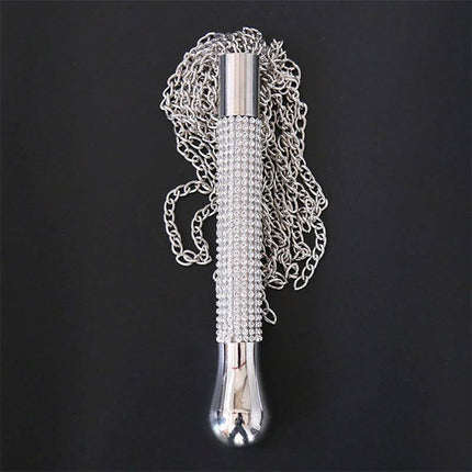 Flogger with Chain Tassel with Rhinestone Handle showcasing silver chain tails and sparkly rhinestone grip against a black background.
