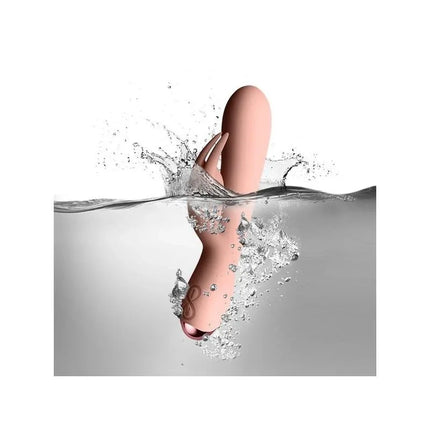 Flutter Rabbit Vibe with Rabbit 2 Motors Pink waterproof and submerged in water, highlighting its silky silicone design and dual motors.