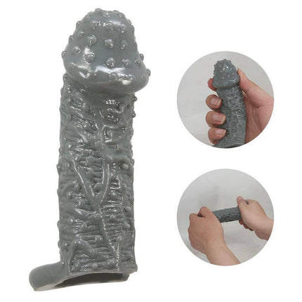 Fogg Penis Sleeve showcasing textured surface and stretchable material with testicle ring for enhanced sensation and control.