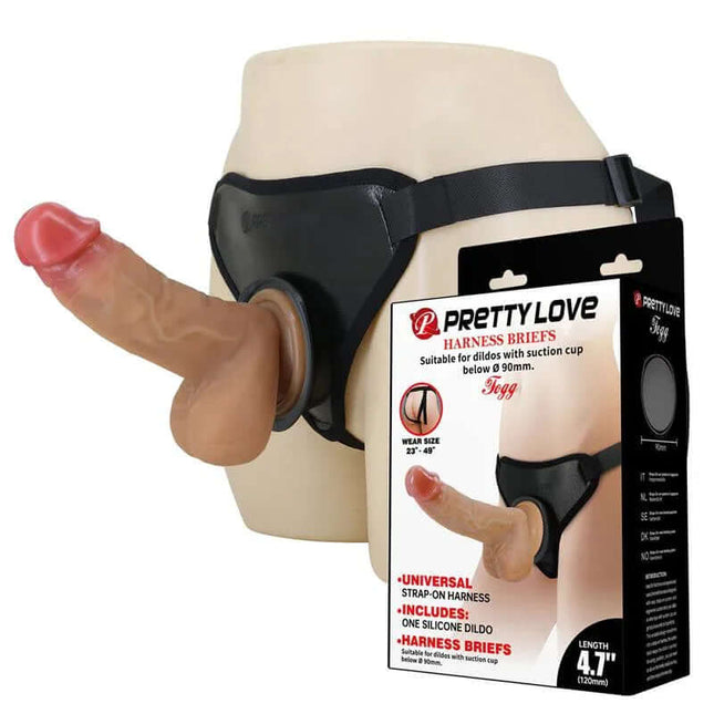 Fogg Universal Strap On Harness with Dildo featuring realistic, vibrating design for enhanced pleasure, shown in packaging.
