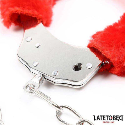 Close-up of Fur Ankle Cuffs Red with fur lining and metal restraint by LATETOBED, highlighting luxurious and secure design for intimate moments.