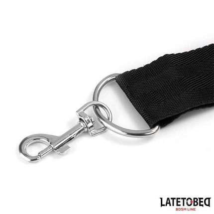 Close-up of Gag Ball and Cufs Restrictions clasp in the Latetobed BDSM Line, showcasing sturdy metal and black fabric design.