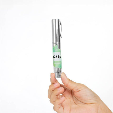 Hand holding Gaia Natural Pheromones Perfume Travel Size 10ml bottle with spray applicator