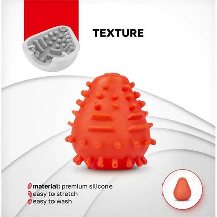 Gegg Masturbator Egg Red with textured interior and premium silicone, easy to wash, compact travel-friendly design by Gvibe.