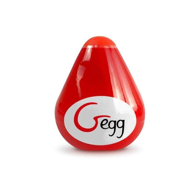 Gegg Masturbator Egg Red from Gvibe, compact pleasure device with soft exterior and textured interior for customizable sensations.
