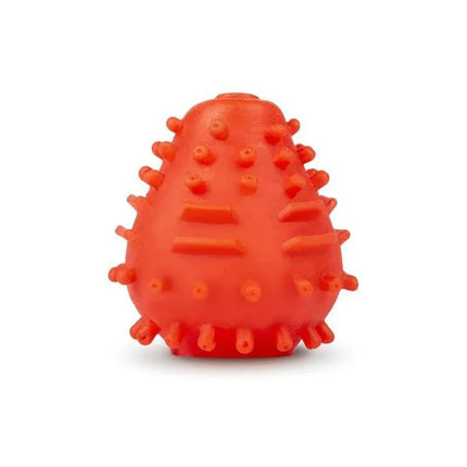 Gegg Masturbator Egg Red with textured exterior for customizable sensations, compact and travel-friendly pleasure device by Gvibe.