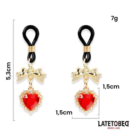 Gem Pendant nipple clamps with gold-tone bows and jeweled red heart design from Latetobed BDSM Line, 5.3cm length, 7g weight.