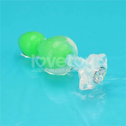 Gemoria Silicone Butt Plug with Glow in Dark Feature on turquoise background