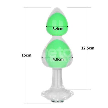 Gemoria Silicone Butt Plug with Glow in Dark Feature showing dimensions and green glow.