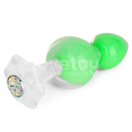 Gemoria Silicone Butt Plug with Glow in Dark Feature, ergonomic design with rolling ball and glow-in-the-dark green color for visibility.