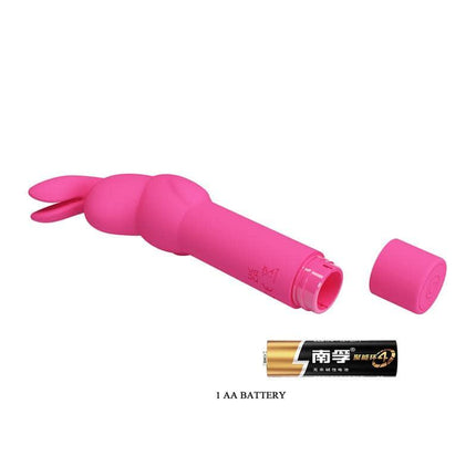 Gerardo Bunny Vibrator in pink with waterproof silicone and 10 vibration modes, shown with battery for clitoral stimulation