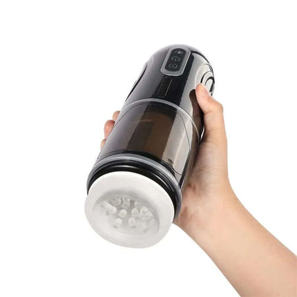 Hand holding Gia Cup Thrusting and Rotating Masturbator, showcasing its compact design and realistic features.