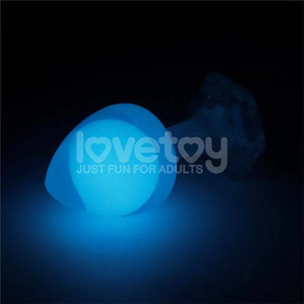 Glow in the Dark Butt Plug - Gemoria Steel Ball Design glowing blue in darkness