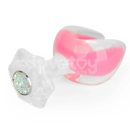 Glow in the Dark Silicone Butt Plug by Gemoria with pink glow and dual crescent tips.