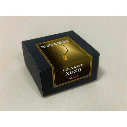 Golden vagina -Shaped Necklace packaging featuring gold-tone pendant in a black box labeled Bijoux Sexy, Colgante XOXO.