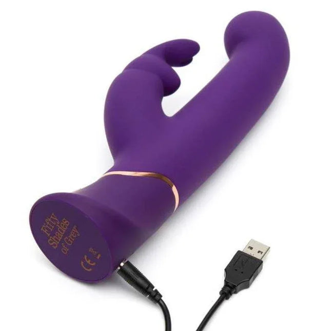 Greedy Girl Vibe with Thrusiting Movements G-Spot Stimulator and Rabbit Purple on white background, USB charging cable connected.