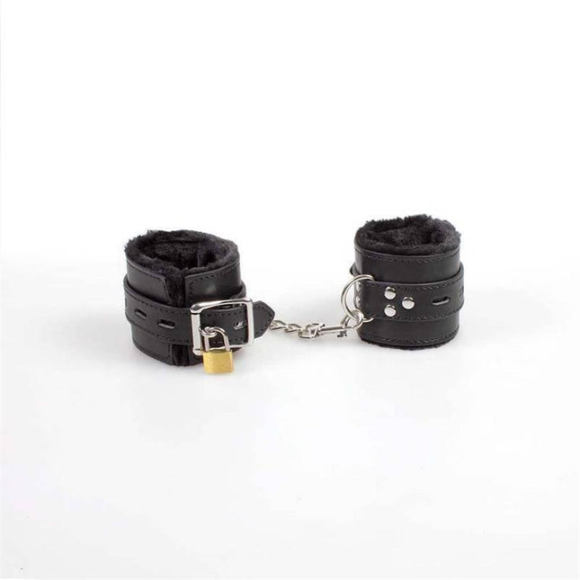 Hand and Anckler Cuffs, faux leather restraints with silver chains for adventurous bondage, lightly padded for comfort and control.