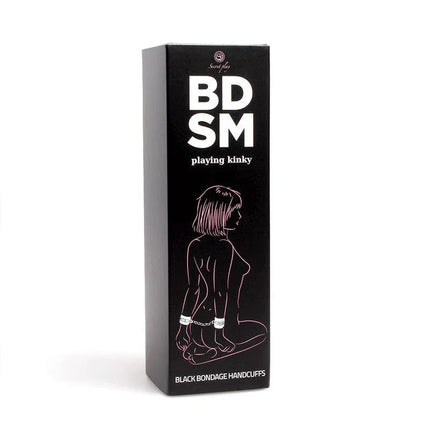 Hand and Anckler Cuffs in black box labeled BDSM playing kinky for bondage enthusiasts