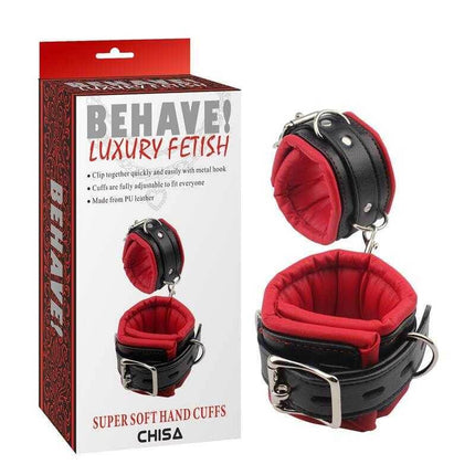 Hand Cuffs Behave with packaging, featuring adjustable soft PU leather cuffs for comfortable restraint, ideal for intimate play.