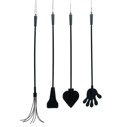 Four black BDSM tools including the Hand Whip Silicone 42 cm, each with unique designs for varied impact and sensation.