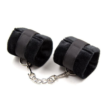 Handcuffs with Velcro with Long Fur Black shown with luxurious black fur and adjustable Velcro closure, designed for intimate play.