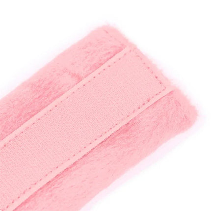 Close-up of Handcuffs with Velcro with Long Fur Pink showing soft pink fur and adjustable velcro strap from Fetish by Intoyou collection.