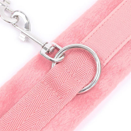 Close-up of Handcuffs with Velcro with Long Fur Pink featuring a durable metal clasp and soft pink fabric.