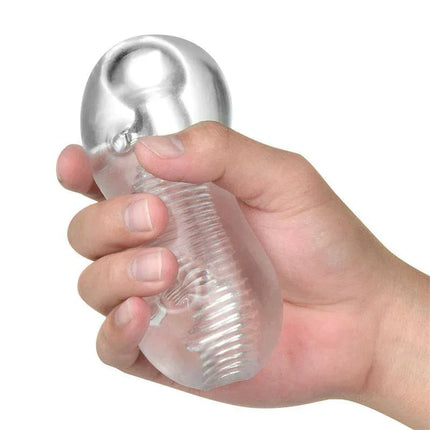 Hand holding Hannx4 Ultimate Handjob Stroker 5.3, showcasing its flexible, body-safe materials and textured interior for enhanced stimulation.