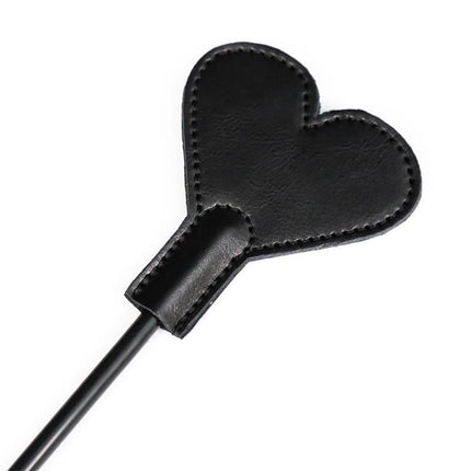 Heart Crop 35 cm black leather riding crop with heart-shaped tip for intimate moments, 35 cm in length, bold style and reliable performance.