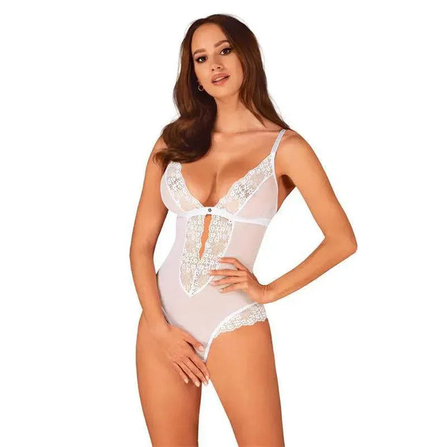 Heavenlly crotchless teddy in white with translucent mesh and embroidered flowers, highlighting a daring, romantic design.