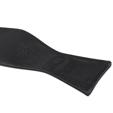 His Rules Bondage Bow Tie featuring silky polyester material, designed for style and intimate restraint.