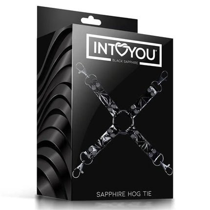 Hog Tie Sapphire Vegan Leather packaged in black box, featuring luxury cross hog tie design with vegan leather straps for bondage play.