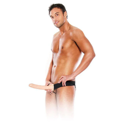 Hollow Strap-On 25 cm Flesh worn by model showcasing adjustable elastic harness for intimate play