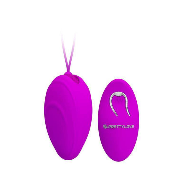 Huevo a Control Remoto Silicone Cover Clave 72 in vibrant pink color with remote control, offering 12 vibration modes for pleasure.