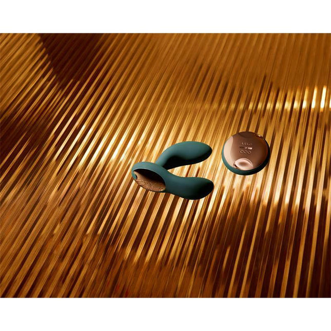 Hugo 2 Remote Control Prostate Massager Black dual-motor design on gold surface