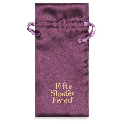 Purple pouch for I Want You Now Steel Love Ring, Fifty Shades Freed official accessory packaging.