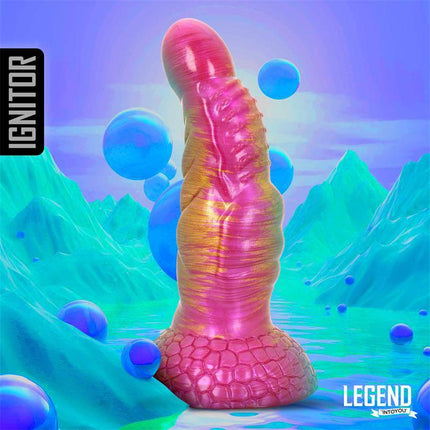 Ignitor Liquid Silicone Dildo 18,3 cm in vibrant colors on fantasy landscape background.