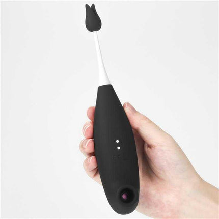 Ijoy Clitoris Sucker and Stimulator in hand, showcasing sleek black design.