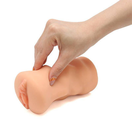 Hand holding Janine Swan Realistic Male Masturbator Vagina, showcasing its lifelike design and ergonomic grip.