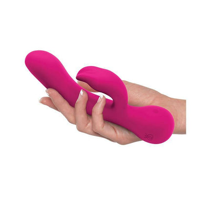 Hand holding JIMMYJANE Rabbits Ruby Rabbit vibrator with U-shaped design and Japanese motor.