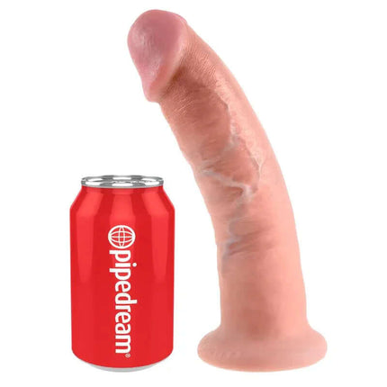 King Cock 22,56 cm Cock - Flesh with suction cup next to a red can for size comparison.