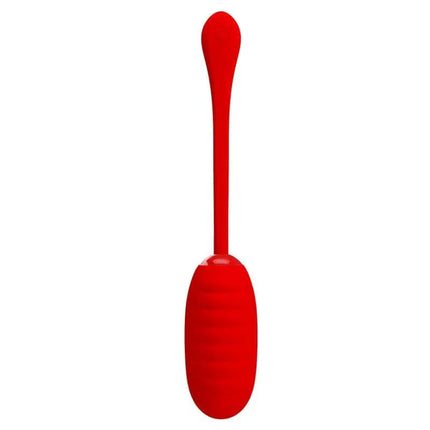 Kirk Vibrating Egg Red with quilted silicone texture and long handle for enhanced solo pleasure.