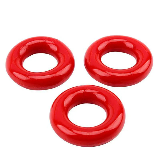 Three red rings from the Kit Anal Wave Probe Red pleasure set, designed for versatility and targeted stimulation.